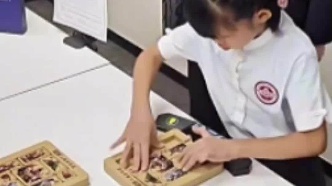 視頻 | 腦快手更快！7歲女孩不到1秒破世界紀錄